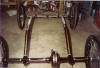 1903 Olds Chassis recieves triple gold stripe